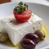 Festive Holiday Cheers Olive and Feta Skewers, a delicious vegetarian appetizer, are skewered and drizzled with olive oil.